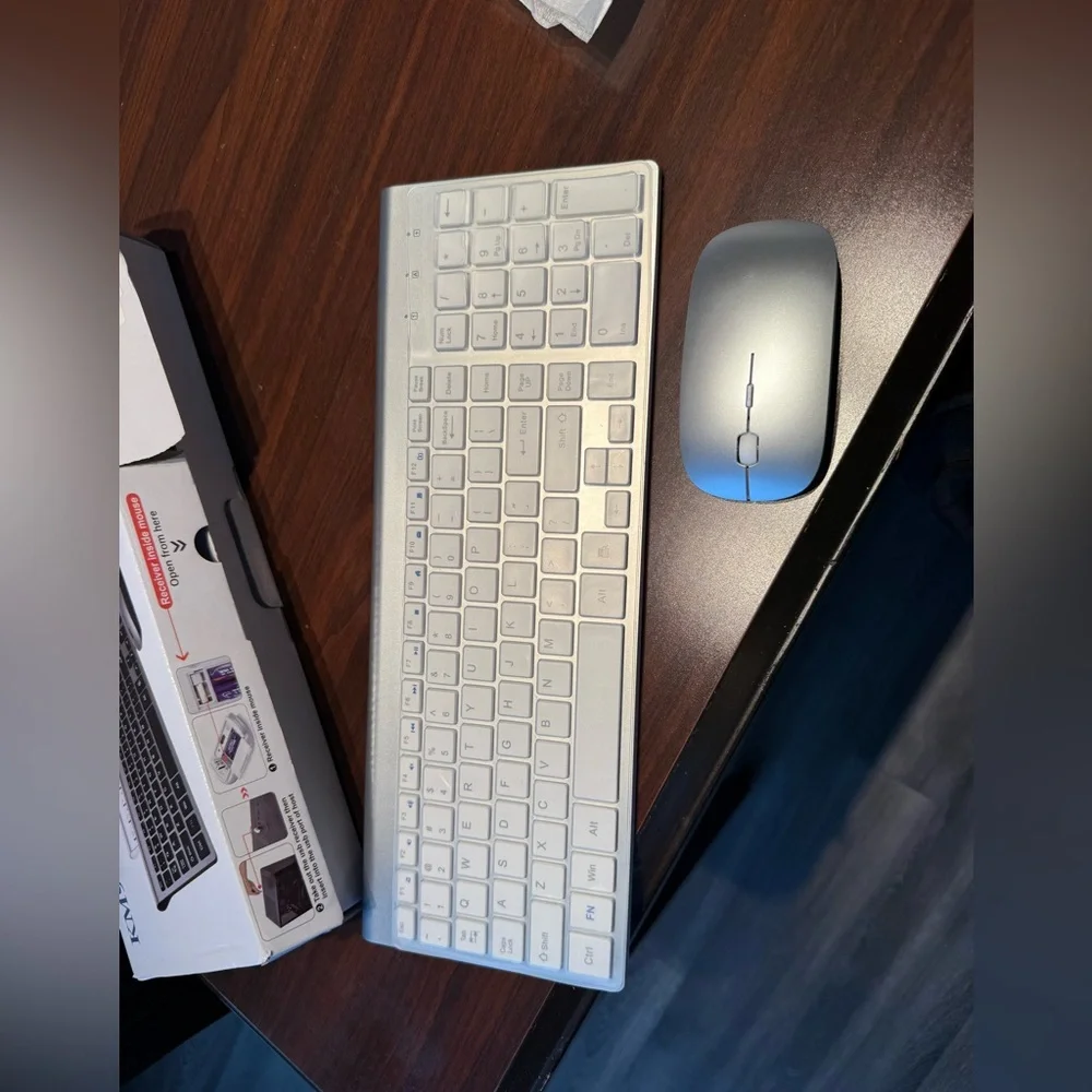 Sleek Silver Wireless Keyboard with mouse